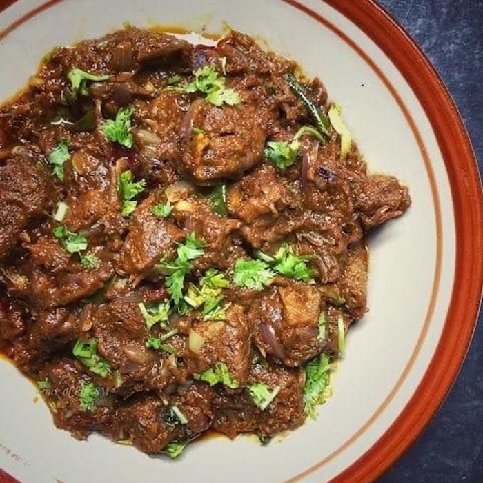 Goat pepper fry with curry leaves and onion